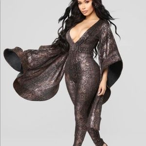 Snake print dramatic long sleeve jumpsuit.
